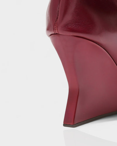 ELOURA Slouch Knee-High Wedge Heel Boots